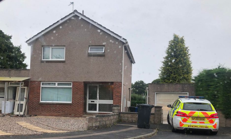 Police outside a home in Ledmore Terrace, Gowrie Park, Dundee