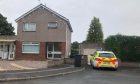 A police car outside the property on August 8 following a cannabis find