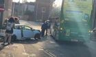 A double-decker bus and a car collided in Dundee. Image: Supplied