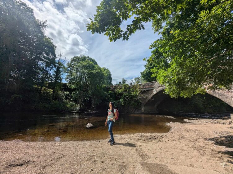 There's a lovely sandy beach beneath the Bridge of Craigisla, as Gayle discovers. Image: Gayle Ritchie.