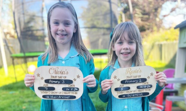 Rosie Malcolm started P1 at Moncreiffe Primary School and sister Olivia went into P3. Image: Stephanie Malcolm.