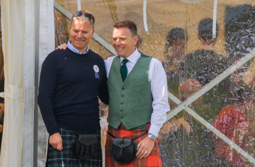 Ewan McGregor alongside his brother Colin at Crieff Highland Gathering.