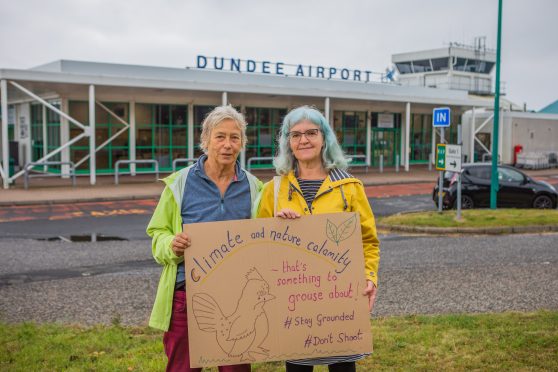 Bridget Cooper (left) and Tanya Jones were both representing the Dundee and Angus Greens at the demonstration. Image:  Steve MacDougall/DC Thomson.