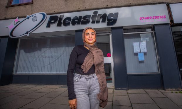 Maha Aziz outside her salon.