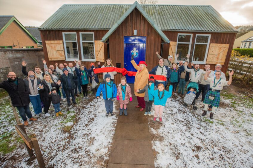 Glamis Scouts celebrate the opening of their rerubished hall.