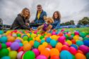 Ruby (aged 1, Bichon Frisé) with owners Eunice Phillips, Rhys Phillips and Isabella Phillips from Perth. Image: Steve MacDougall/DC Thomson