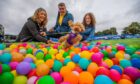 Ruby (aged 1, Bichon Frisé) with owners Eunice Phillips, Rhys Phillips and Isabella Phillips from Perth. Image: Steve MacDougall/DC Thomson