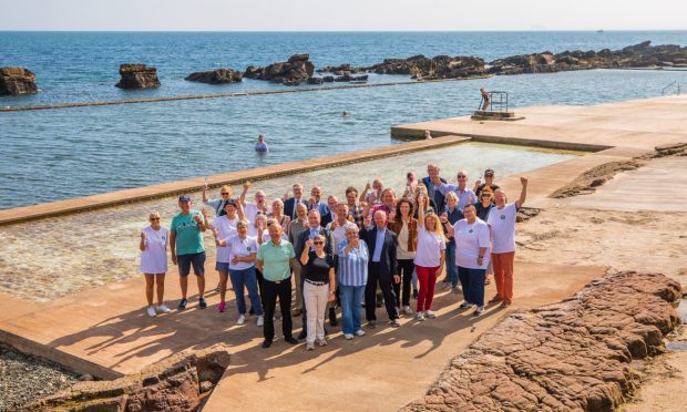 The Cellardyke tidal pool committee celebrate the official reopening after restoration