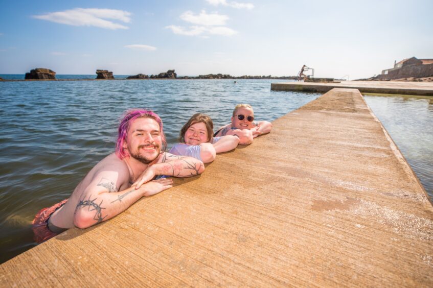  left to right is Kyle Stewart, Meg Grant and Georgia Brown, visiting from Glasgow to celebrate Georgia's birthday at the Tidal Pool - 