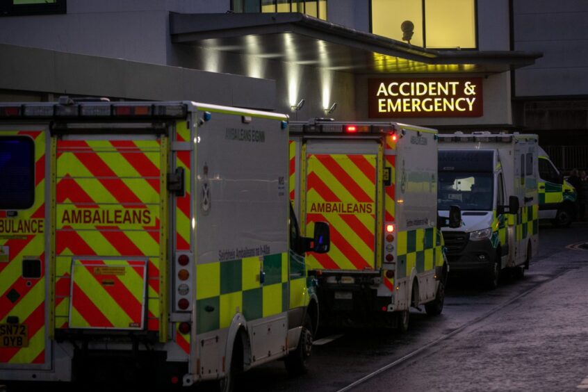 Ambulances waiting outside a hospital A&E department