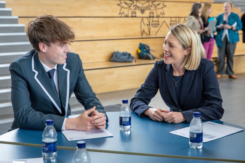 Leo Brady speaks to Scottish education minister  Jenny Gilruth about his exam results at Madras College. Image: Steve Brown/DC Thomson