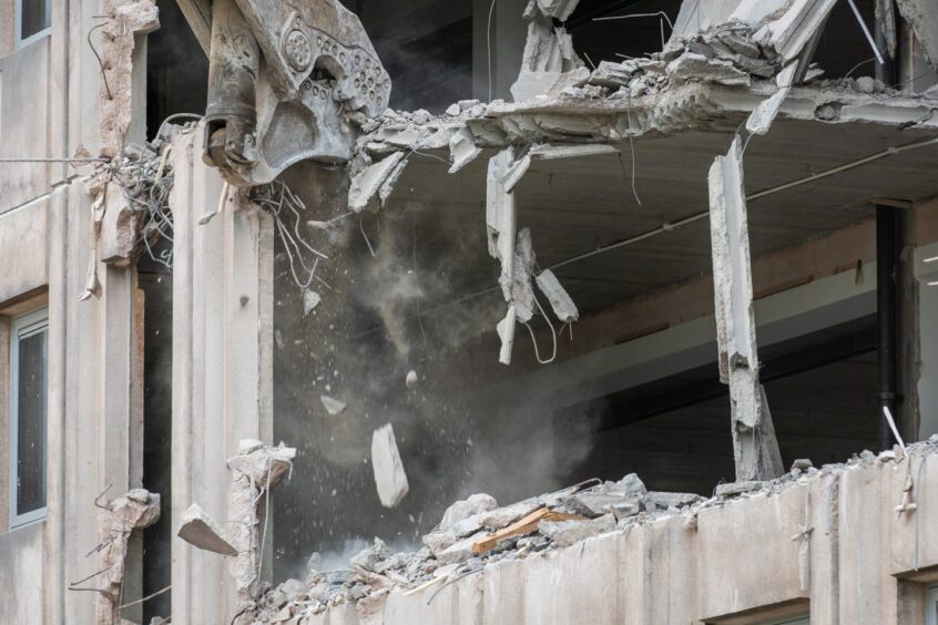 A close up of the demolition process.