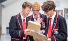 Scott Black, Jack Massey and Euan Black share their long-awaited results. Image: Steve Brown/DC Thomson.