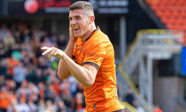 Ross Graham celebrates while playing for Dundee United