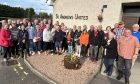 St Andrews United Club members gather outside the facility now earmarked for closure.