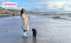 Kirsty and her puppy enjoying a beach walk. Image: Kirsty Strickland