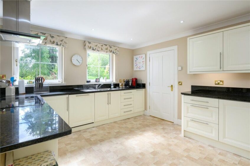 The kitchen sits at the rear of the home.