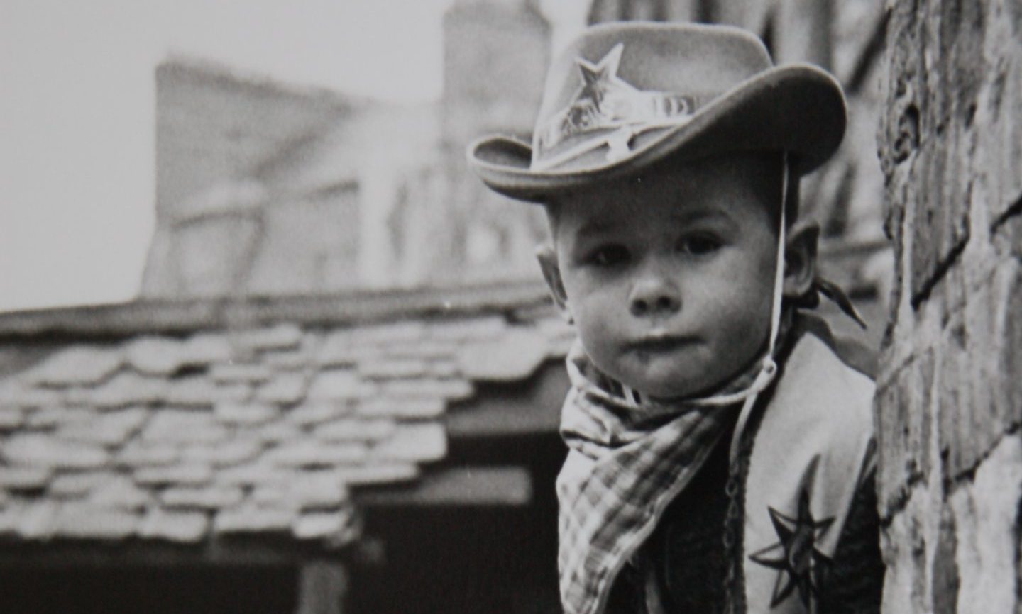 A young cowboy in Watson Street in the 1960s. Image: DC Thomson.