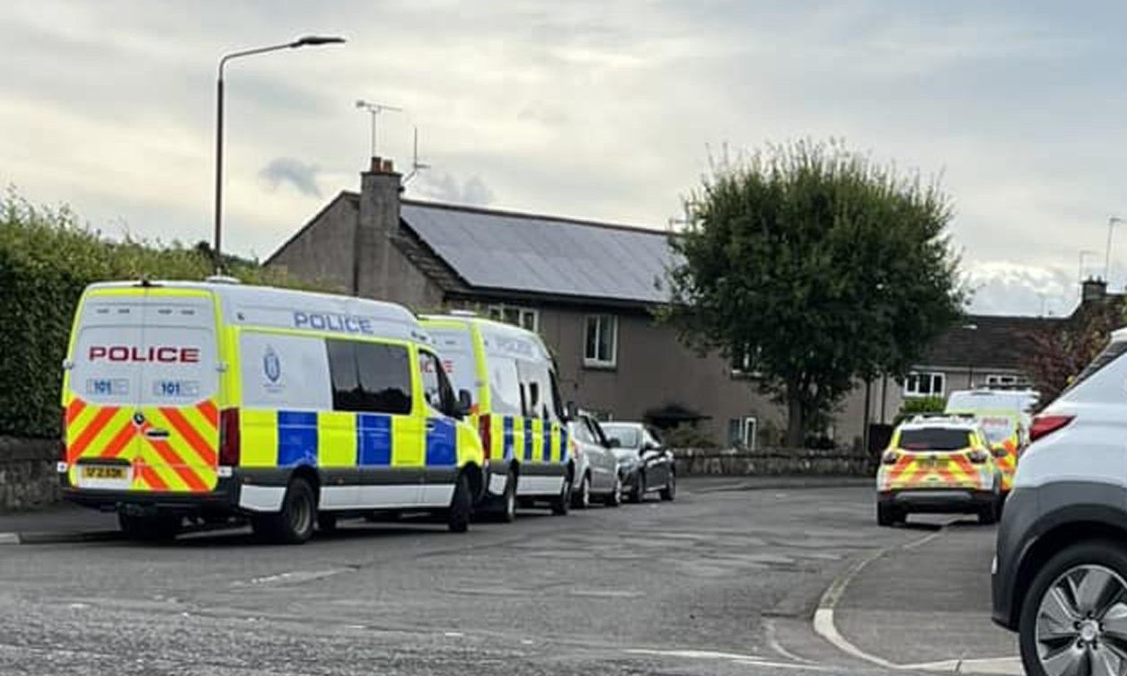 Riot police have raided a home on Albert Street in Dunblane. Image: Frazer Plank