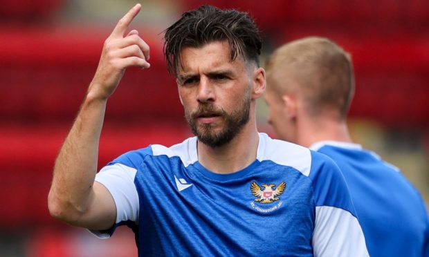 St Johnstone's Graham Carey gestures while on the pitch for the Saints