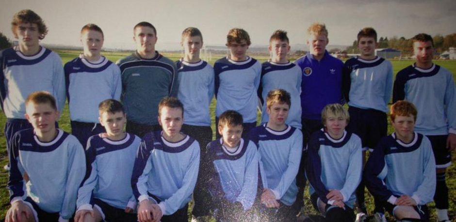 Charlie and Mark, aged 14, when they played football together - Mark is second from the left, and Charlie third from the right.