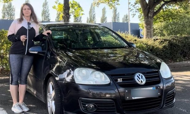 Emily Guidoni with her car.