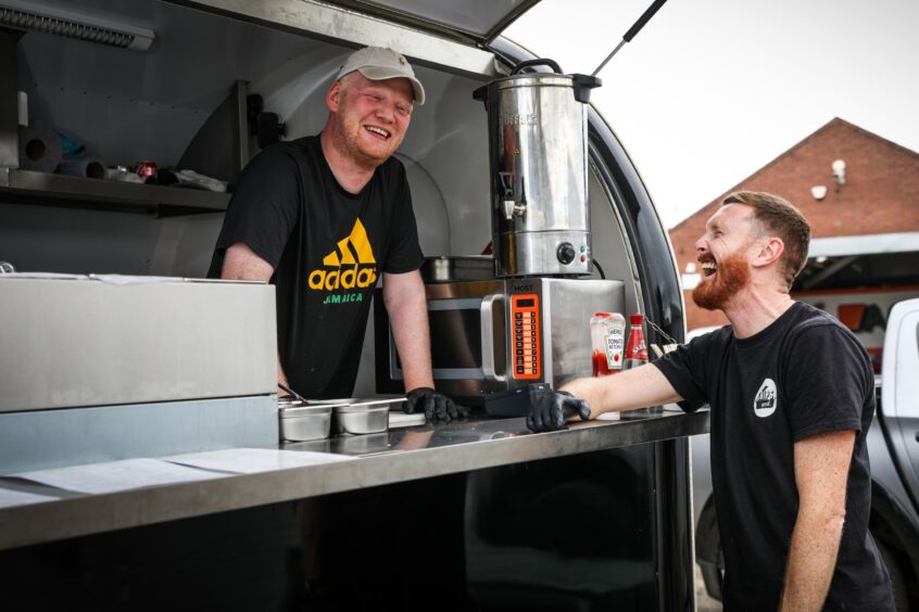 Great pals Mark and Charlie at the 'Chips And...' food truck near Clepington Road.