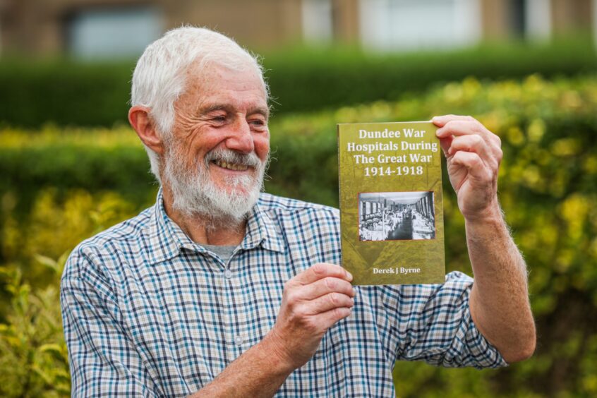 Derek Byrne with his book on Dundee war hospitals