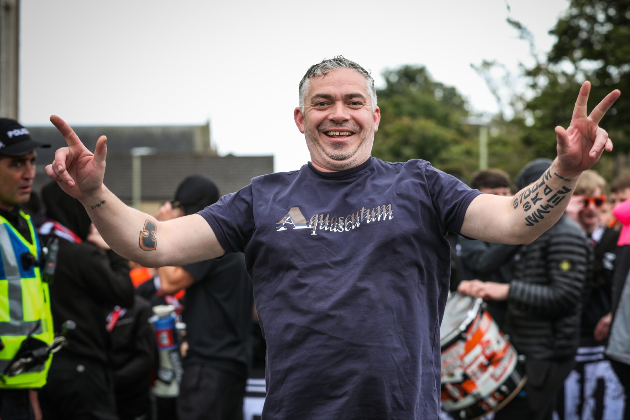 An excited fan before the match.