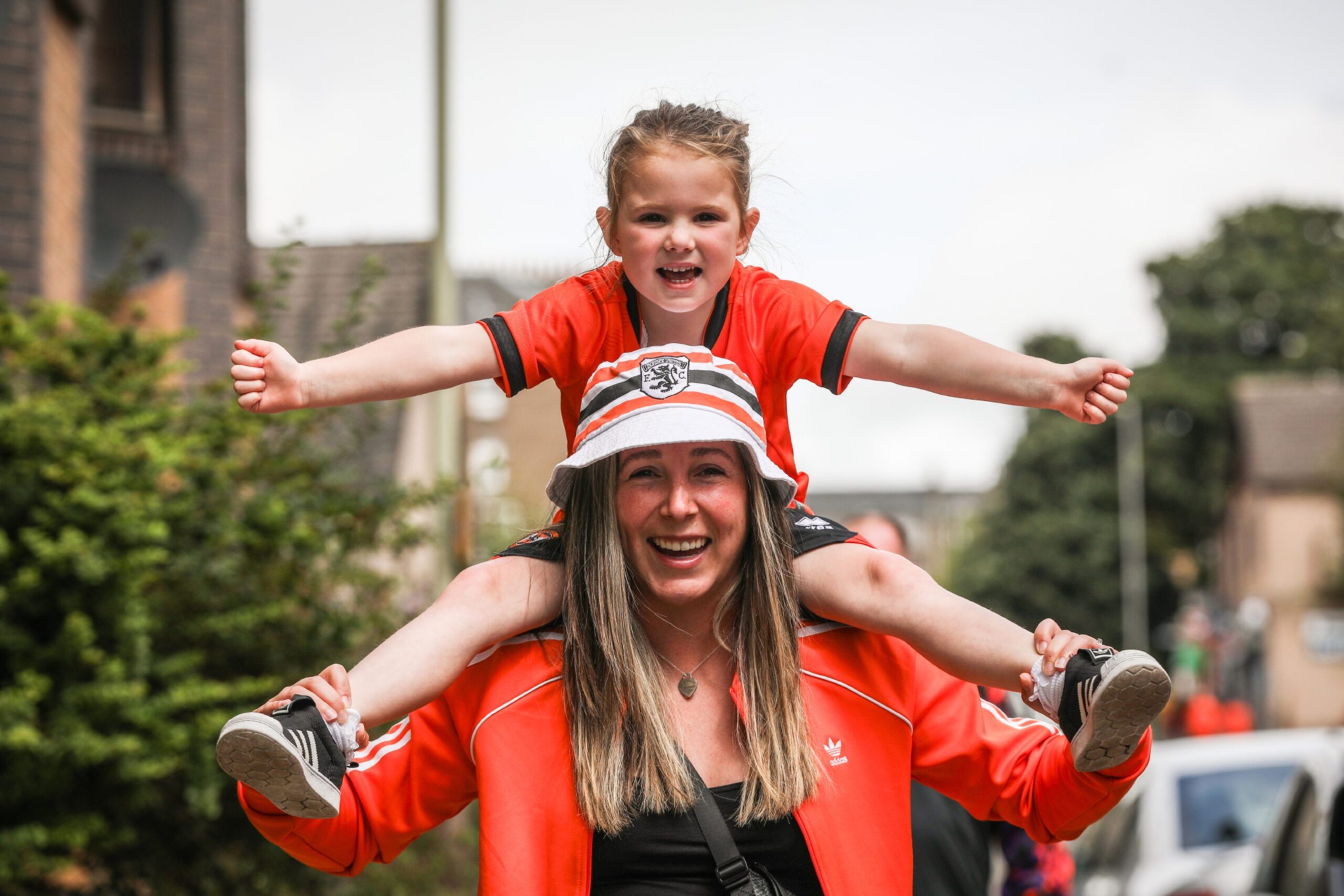 Christie Laird with her four-year-old daughter Eden on her shoulders.