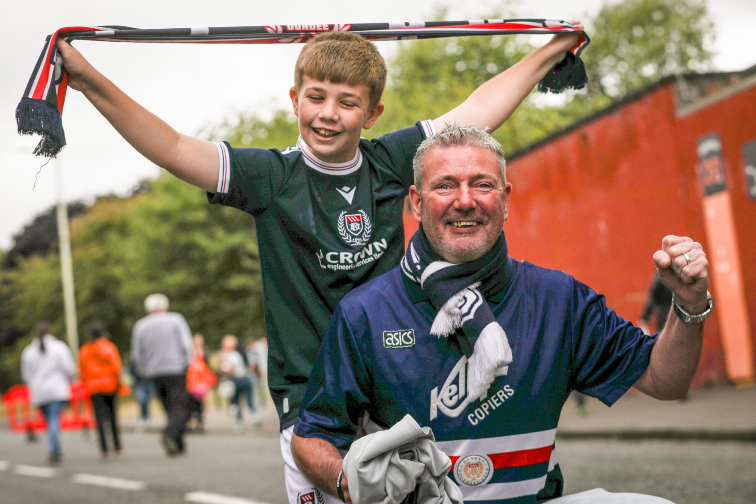 Dundee supporter Charlie Anderson with his dad Raymond.