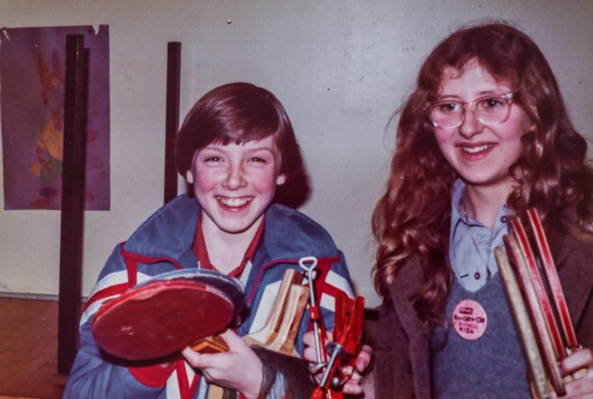 two girls holding bats as they play Table tennis in the Fintry Clubbie in 1979. 