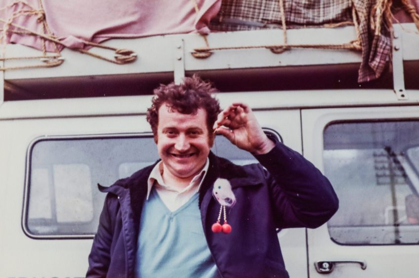 Fintry Clubbie legend Charlie Morgan pictured beside a minibus back in the day.