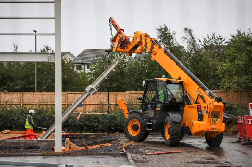 Workers erecting the new steel frame at Monifieth McDonalds 