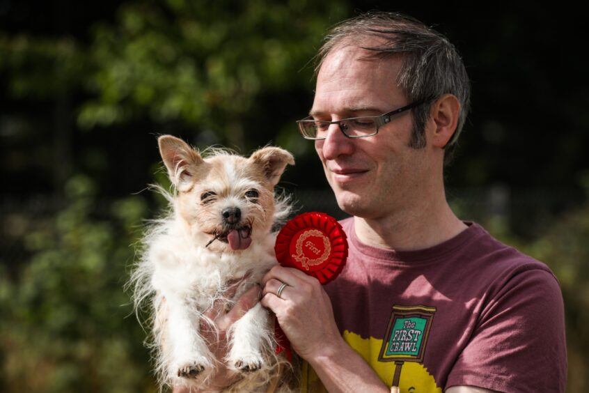 Pal, 15, wins 1st place in the Scruffiest Dog category with owner Grant Clayson. Photo by Mhairi Edwards/DC Thomson.