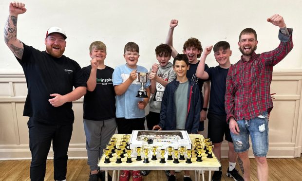 Pictured (from left) Pipe major Cameron Barnes, Kai Hay, Noah Beattie, Daniel Clunie, Angus Gourlay, Darraich Clunie, Taylor Dalrymple and drum sergeant Craig Brown. Image: Cammy Barnes