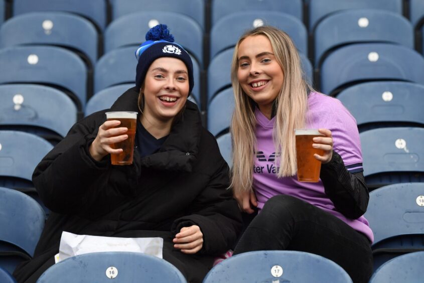 You can enjoy a drink at a game of rugby. 