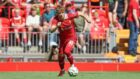 Dundee United target Luca Stephenson in friendly action for Liverpool against Sevilla last weekend. Image: Shutterstock