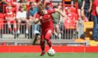 Dundee United target Luca Stephenson in friendly action for Liverpool against Sevilla last weekend. Image: Shutterstock