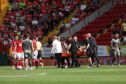 Josh Edwards of Charlton Athletic is stretchered off after a tackle with Sean Clare of Leyton Orient. Image: Shutterstock