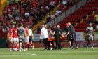 Josh Edwards of Charlton Athletic is stretchered off after a tackle with Sean Clare of Leyton Orient. Image: Shutterstock