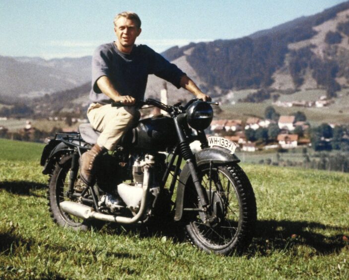 Steve McQueen on motorbike in scene from the Great Escape film