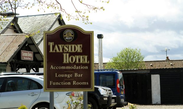 A sign for the Tayside Hotel in Stanley, Perthshire.