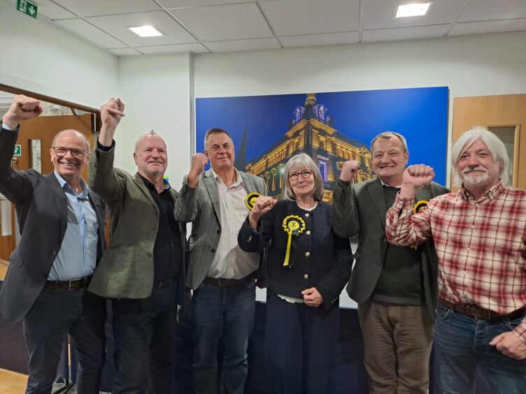 Carol Mair in group of SNP councillors and members of parliament