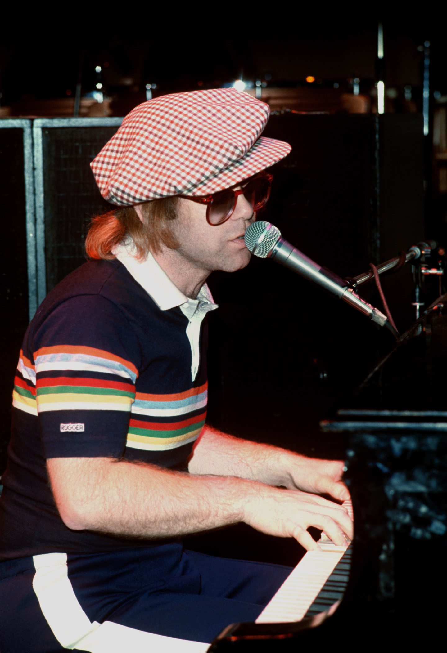 Elton John rehearsing at the piano before a London show in 1977. 