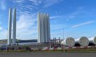 A dozen turbine towers have been standing at the Port of Dundee for most of this year. Image: Rob McLaren/DC Thomson