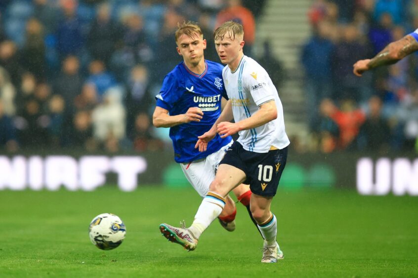 Lyall Cameron takes on Rangers at Ibrox