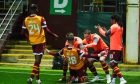 Motherwell's Lennon Miller celebrates his stoppage time winner over Dundee United. Image: Shutterstock