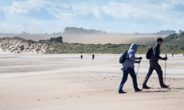 Wind blowing the sand at Lunan Bay in Angus.