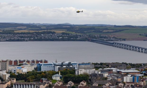 Police helicopter as seen from Dundee Law.